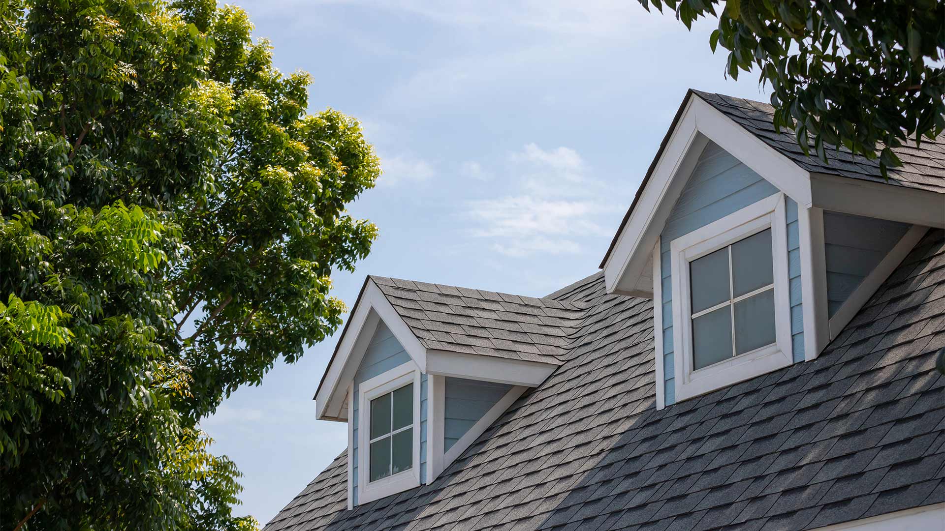 Home with a new shingle roof installed by Hammer Exteriors in New Jersey
